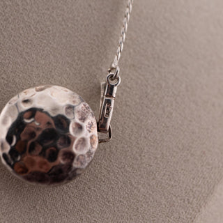 Reserved Grace sterling silver Saturn chain necklace with a hammered round pendant on a 16-inch delicate chain.