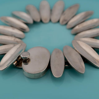 Reserved Grace vintage Taxco Mexican Modernist sterling silver link bracelet with polished convex oval sunburst links.