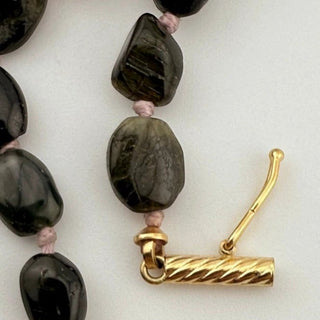Reserved Grace vintage tourmaline bead necklace featuring faceted dark gemstone beads and a textured 14K gold clasp.