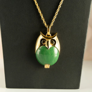 Reserved Grace vintage Crown Trifari gold tone owl pendant necklace with a green lucite jelly belly on a gold chain.