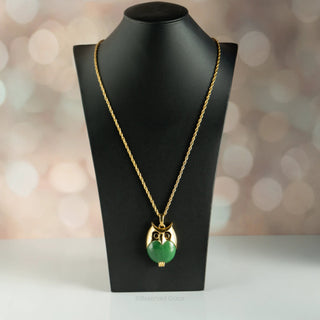 Reserved Grace vintage Crown Trifari gold tone owl pendant necklace with a green lucite jelly belly on a rope chain.
