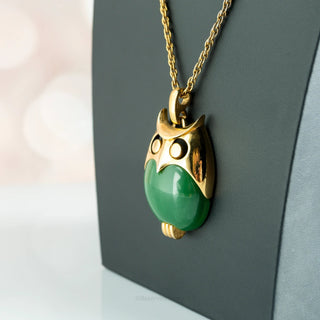 Reserved Grace vintage Crown Trifari gold tone owl pendant necklace with a green lucite jelly belly on a chain.
