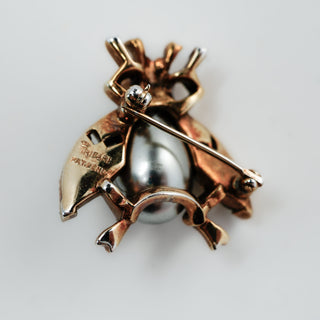Reserved Grace vintage Trifari Pat Pend insect brooch back view showing silver-gray cabochon and metal pin detail
