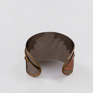 Reserved Grace Anju tri-tone cuff bracelet featuring hammered silver, copper, and brass leaf appliqués.