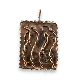 Reserved Grace hand-stamped rectangular silver pendant featuring four vertical twisted wire accents and textured edges.