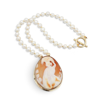 Reserved Grace vintage Fran Ridell handcrafted necklace featuring a detailed carved cameo pendant and lustrous pearls.