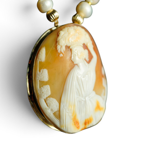 Reserved Grace vintage Fran Ridell handcrafted cameo necklace featuring a detailed carved figure and lustrous pearls.