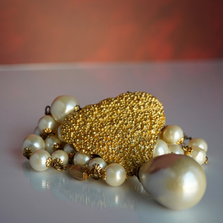 Reserved Grace vintage gold-tone heart pendant necklace with faux pearls and a large drop pearl on a 24-inch chain.