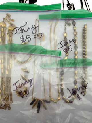 Reserved Grace vintage gold-tone jewelry set featuring chain necklaces, black accent earrings, and a cameo pendant.