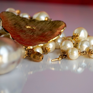 Reserved Grace vintage Marvella gold-tone heart pendant necklace with lustrous faux pearls and textured metal finish.