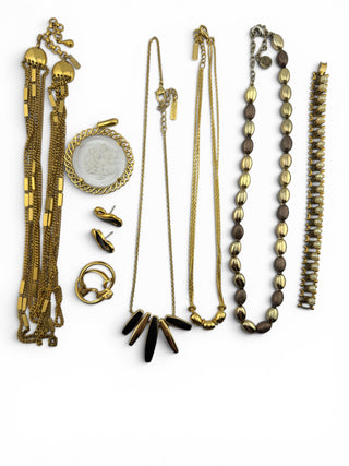 Reserved Grace vintage Napier gold-tone jewelry set including layered chains, statement necklaces, earrings, and bracelet