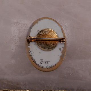 Reserved Grace vintage 1985 hand-painted Norwegian ceramic brooch with gold-toned pin mechanism and artist signature.