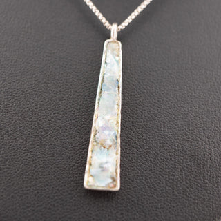 Reserved Grace vintage sterling silver pendant with iridescent inlay on an 18-inch chain against a black background