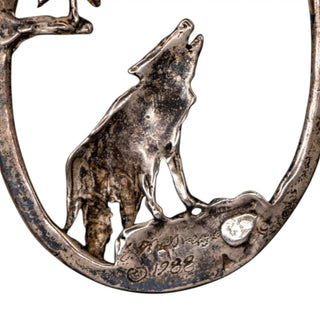 Reserved Grace vintage sterling silver pendant featuring a detailed wolf howling at the moon in an oval frame