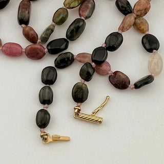 Reserved Grace vintage tourmaline bead necklace featuring multi-colored faceted gemstones and a 14K gold safety clasp.
