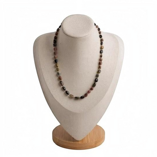 Reserved Grace vintage multi-color faceted tourmaline bead necklace with a 14K gold clasp on a jewelry display bust.