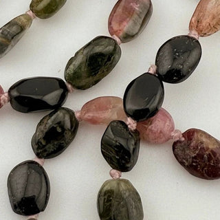 Reserved Grace vintage tourmaline bead necklace featuring faceted multi-color gemstone beads in green, pink, and black.