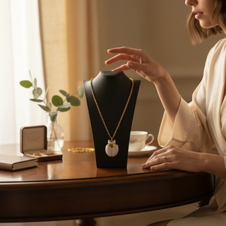 Reserved Grace vintage Crown Trifari beetle pendant necklace with white lucite and gold-tone metal on a display bust.
