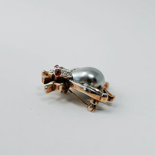 Reserved Grace vintage Trifari insect brooch with silver-gray cabochon body and sparkling rhinestone accents