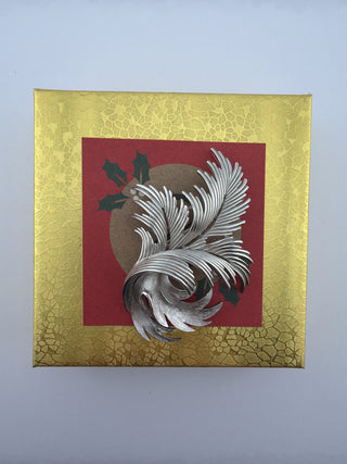 Reserved Grace vintage Trifari silver-tone leaf brooch with brushed metal texture on a decorative gold and red gift box.