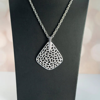 Reserved Grace vintage Crown Trifari silver tone pendant necklace featuring a mod leopard spot cutout pattern