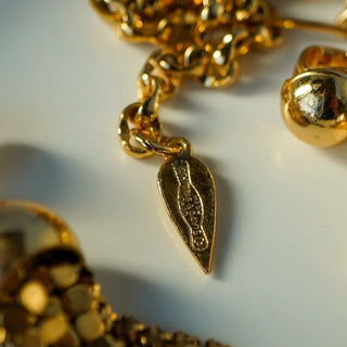 Reserved Grace vintage Whiting & Davis gold-tone metal mesh jewelry set showing the signature maker mark tag.