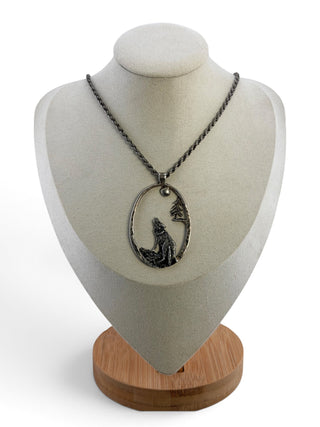 Reserved Grace sterling silver oval pendant featuring a wolf howling at a crescent moon on a 24-inch chain